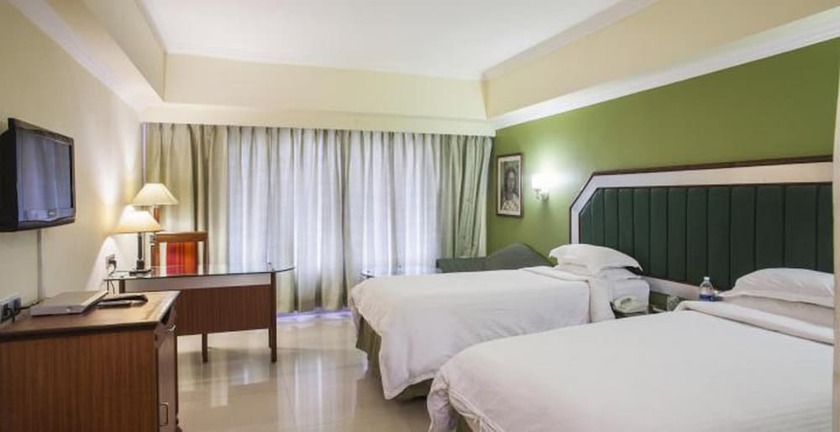 Imagen de la habitación del Hotel Swosti Premium Bhubaneswar. Foto 22