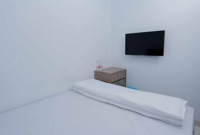 Imagen de la habitación del Hotel Syariah Amethyst Cengkareng. Foto 16