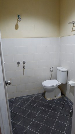 Imagen de la habitación del Hotel Syariah Larismanis. Foto 5