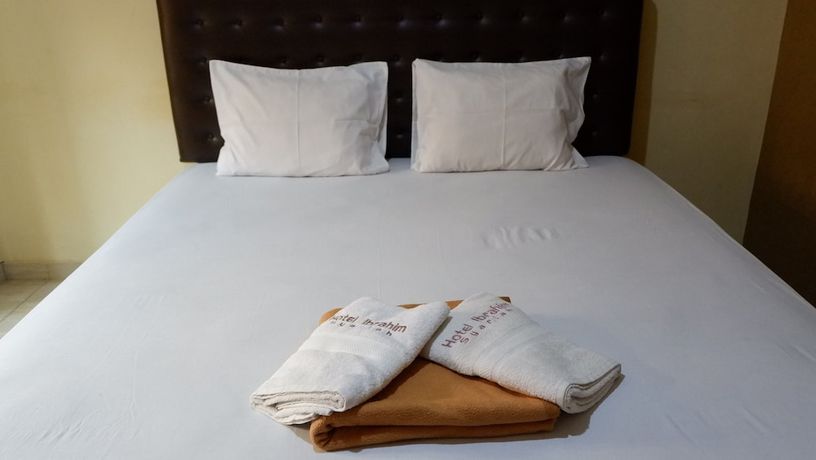 Imagen de la habitación del Hotel Syariah Larismanis. Foto 6
