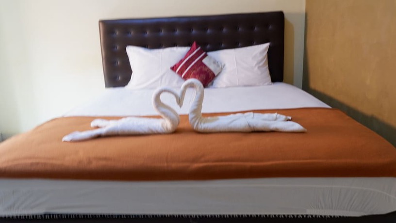 Imagen de la habitación del Hotel Syariah Larismanis. Foto 11