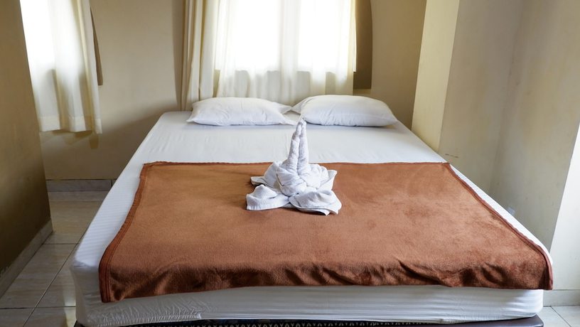 Imagen de la habitación del Hotel Syariah Larismanis. Foto 13