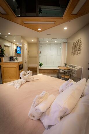 Imagen de la habitación del Hotel Sybaris Pool Suites. Foto 6