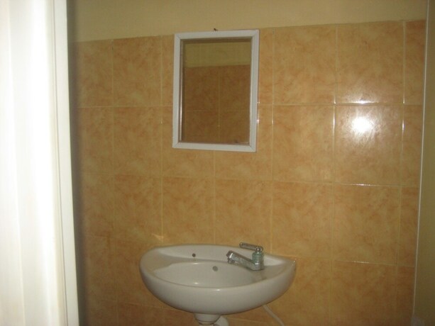 Imagen de la habitación del Hotel Syifa Homestay. Foto 17