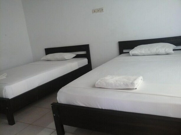 Imagen de la habitación del Hotel Syifa Homestay. Foto 18