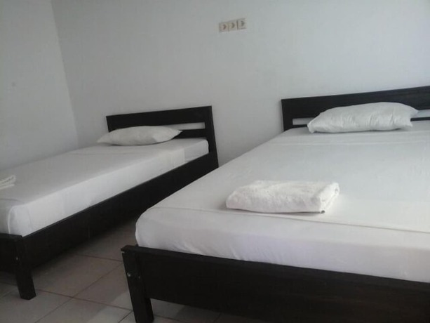 Imagen de la habitación del Hotel Syifa Homestay. Foto 19