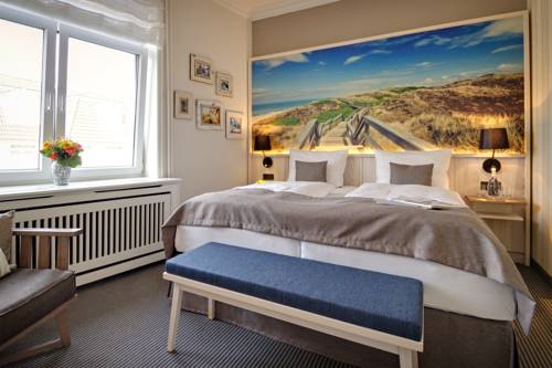 Imagen de la habitación del Hotel Sylter Domizil. Foto 14