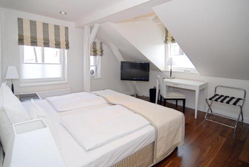 Imagen de la habitación del Hotel Sylthotel Raffelh&uuml;schen Garni. Foto 7