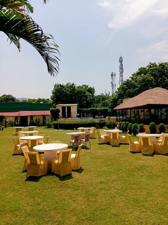 Imagen del bar/restaurante del Hotel Symphony By Devbhoomi Corbett Resort. Foto 11