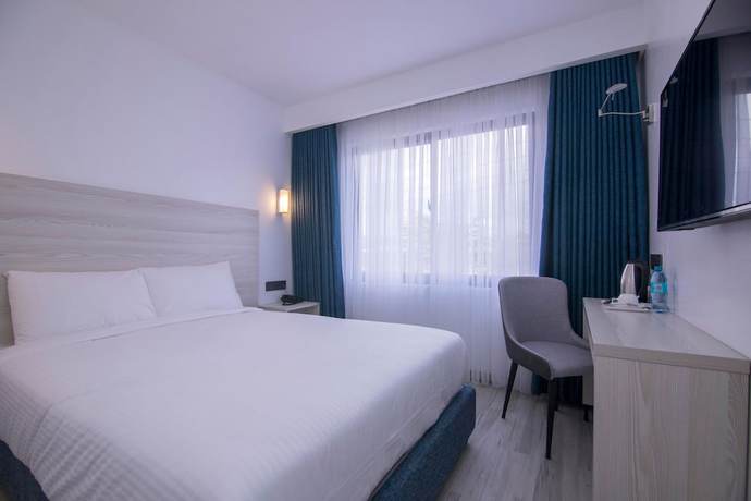 Imagen de la habitación del Hotel Symphony. Foto 8