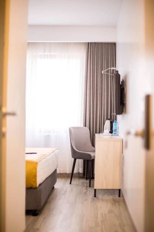 Imagen de la habitación del Hotel Symphony. Foto 14