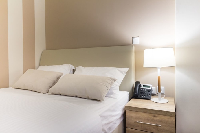 Imagen de la habitación del Hotel @ Syngrou Fix. Foto 11