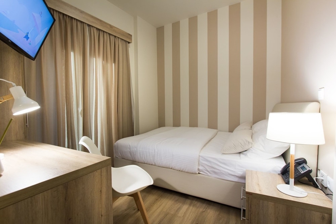 Imagen de la habitación del Hotel @ Syngrou Fix. Foto 12