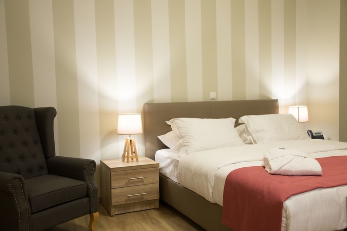 Imagen de la habitación del Hotel @ Syngrou Fix. Foto 18