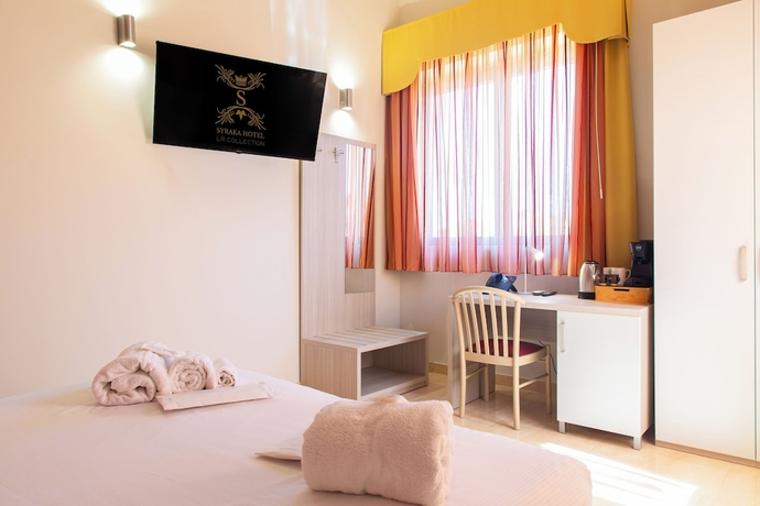 Imagen de la habitación del Hotel Syraka LR Collection. Foto 12