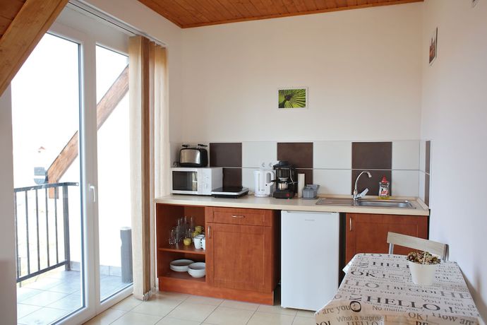 Imagen de la habitación del Hotel Szabolcs Apartments. Foto 3