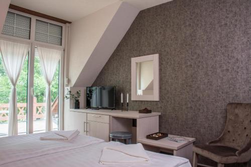 Imagen de la habitación del Hotel Szalajka Fogad&oacute; &eacute;s &Eacute;tterem. Foto 9