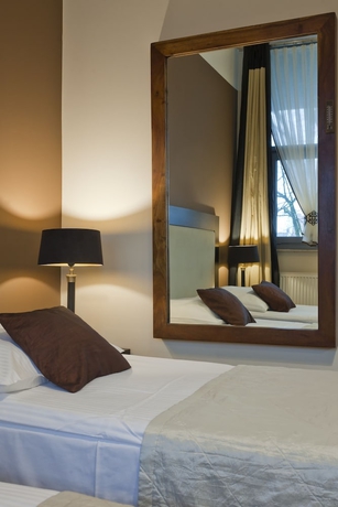 Imagen de la habitación del Hotel Szara Willa. Foto 11