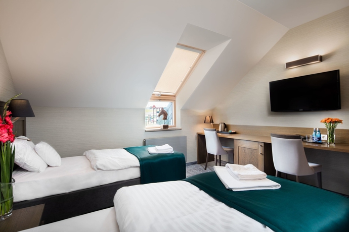 Imagen de la habitación del Hotel Szary Residence. Foto 9