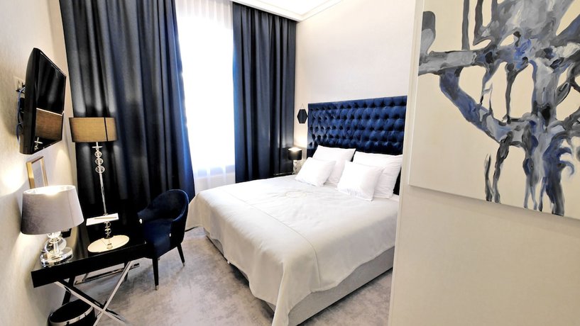 Imagen de la habitación del Hotel Szewska 22 Boutique. Foto 11