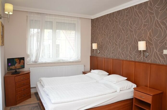 Imagen de la habitación del Hotel Szieszta Panzi&oacute;. Foto 17