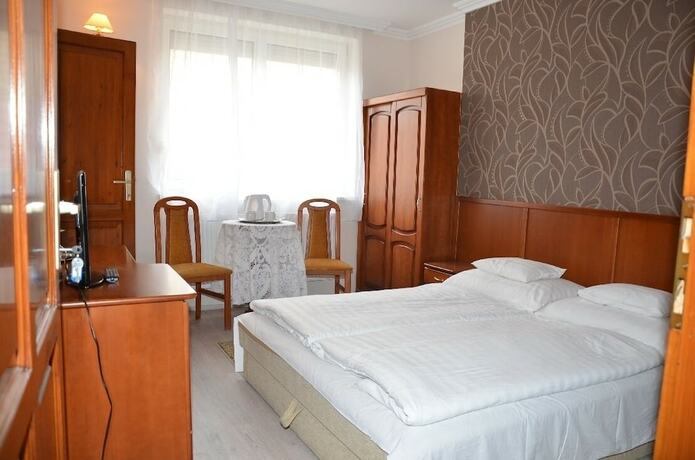 Imagen de la habitación del Hotel Szieszta Panzi&oacute;. Foto 20