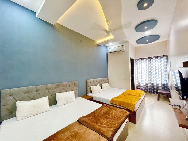 Imagen de la habitación del Hotel T P Inn near Mahakaleshwar Temple. Foto 9