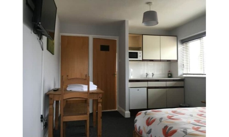 Imagen de la habitación del Hotel T and J Motel. Foto 15