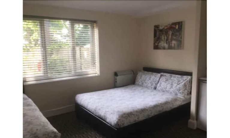 Imagen de la habitación del Hotel T and J Motel. Foto 16