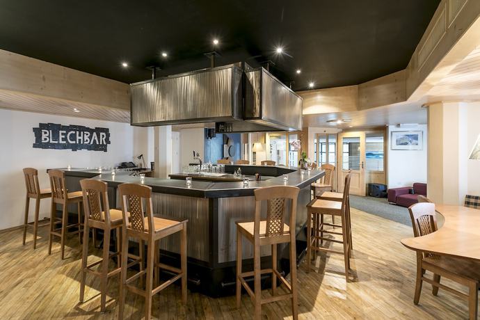 Imagen del bar/restaurante del Hotel T3 Alpenhotel Flims. Foto 7