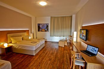 Imagen de la habitación del Hotel T3 Cityloft. Foto 4