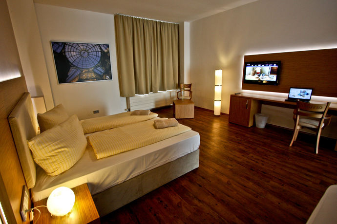 Imagen de la habitación del Hotel T3 Cityloft. Foto 7