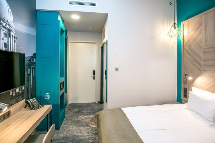 Imagen de la habitación del Hotel T62. Foto 7