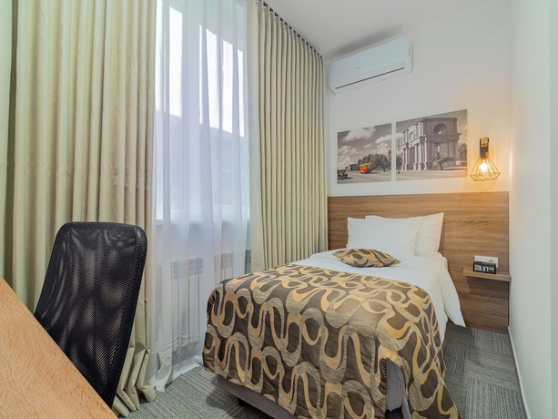 Imagen de la habitación del Hotel T.A. Collection. Foto 4