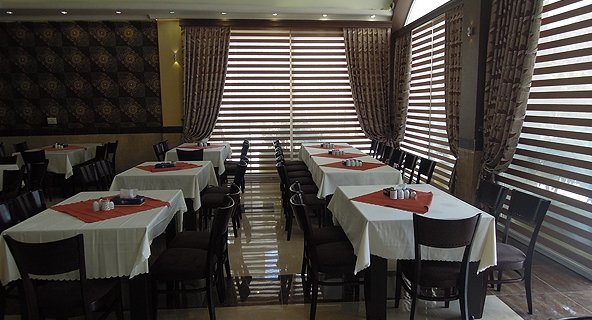 Imagen del bar/restaurante del Hotel TABRIZ INTERNATIONAL. Foto 4