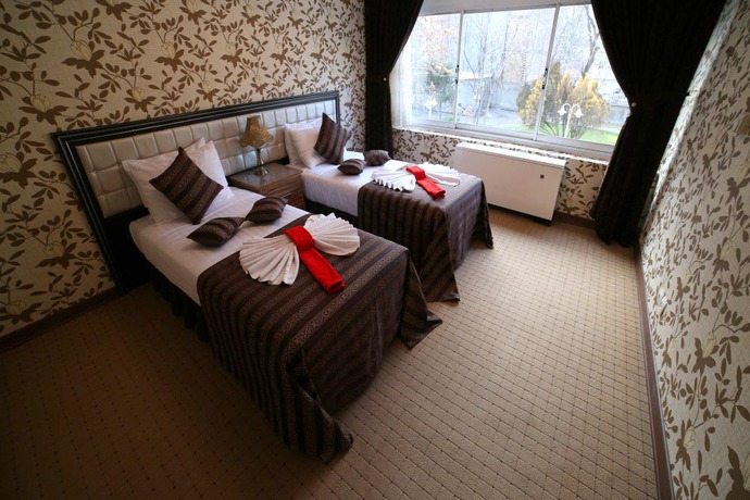 Imagen de la habitación del Hotel TABRIZ INTERNATIONAL. Foto 10