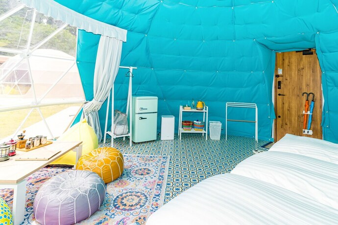 Imagen de la habitación del Hotel TACO GLAMP. Foto 17