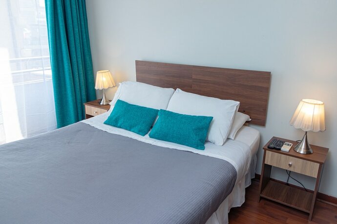 Imagen de la habitación del Hotel TAGLE APARTMENTS. Foto 11