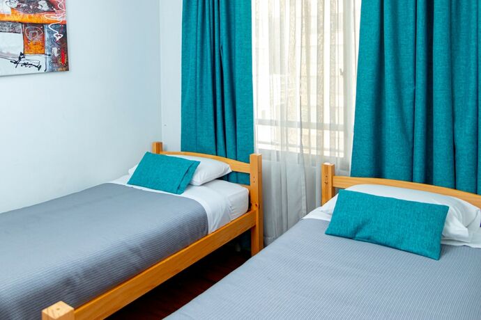Imagen de la habitación del Hotel TAGLE APARTMENTS. Foto 13