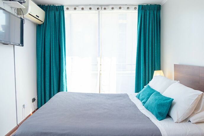 Imagen de la habitación del Hotel TAGLE APARTMENTS. Foto 17