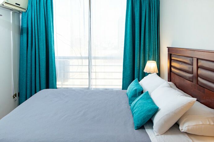 Imagen de la habitación del Hotel TAGLE APARTMENTS. Foto 18