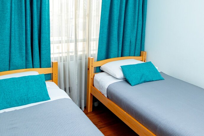 Imagen de la habitación del Hotel TAGLE APARTMENTS. Foto 19