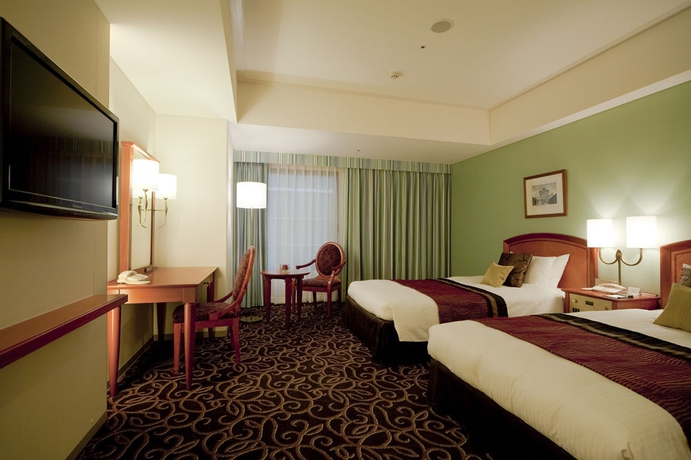 Imagen de la habitación del Hotel TAKAKURA. Foto 1