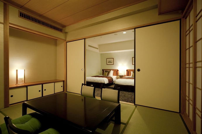 Imagen de la habitación del Hotel TAKAKURA. Foto 2