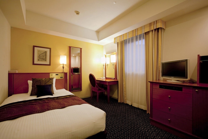 Imagen de la habitación del Hotel TAKAKURA. Foto 3