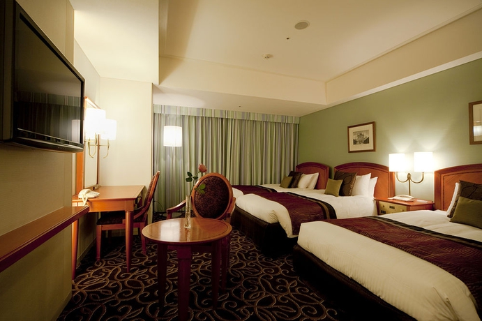 Imagen de la habitación del Hotel TAKAKURA. Foto 4