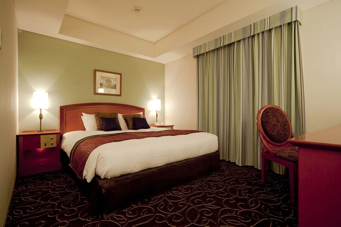 Imagen de la habitación del Hotel TAKAKURA. Foto 5