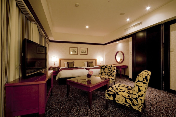 Imagen de la habitación del Hotel TAKAKURA. Foto 6