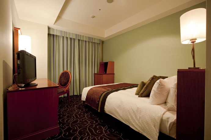 Imagen de la habitación del Hotel TAKAKURA. Foto 7