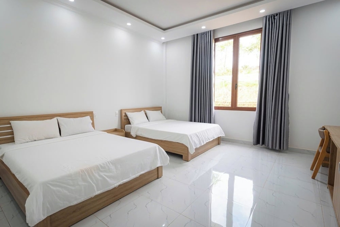 Imagen de la habitación del Hotel TAM CHAU FARM. Foto 9